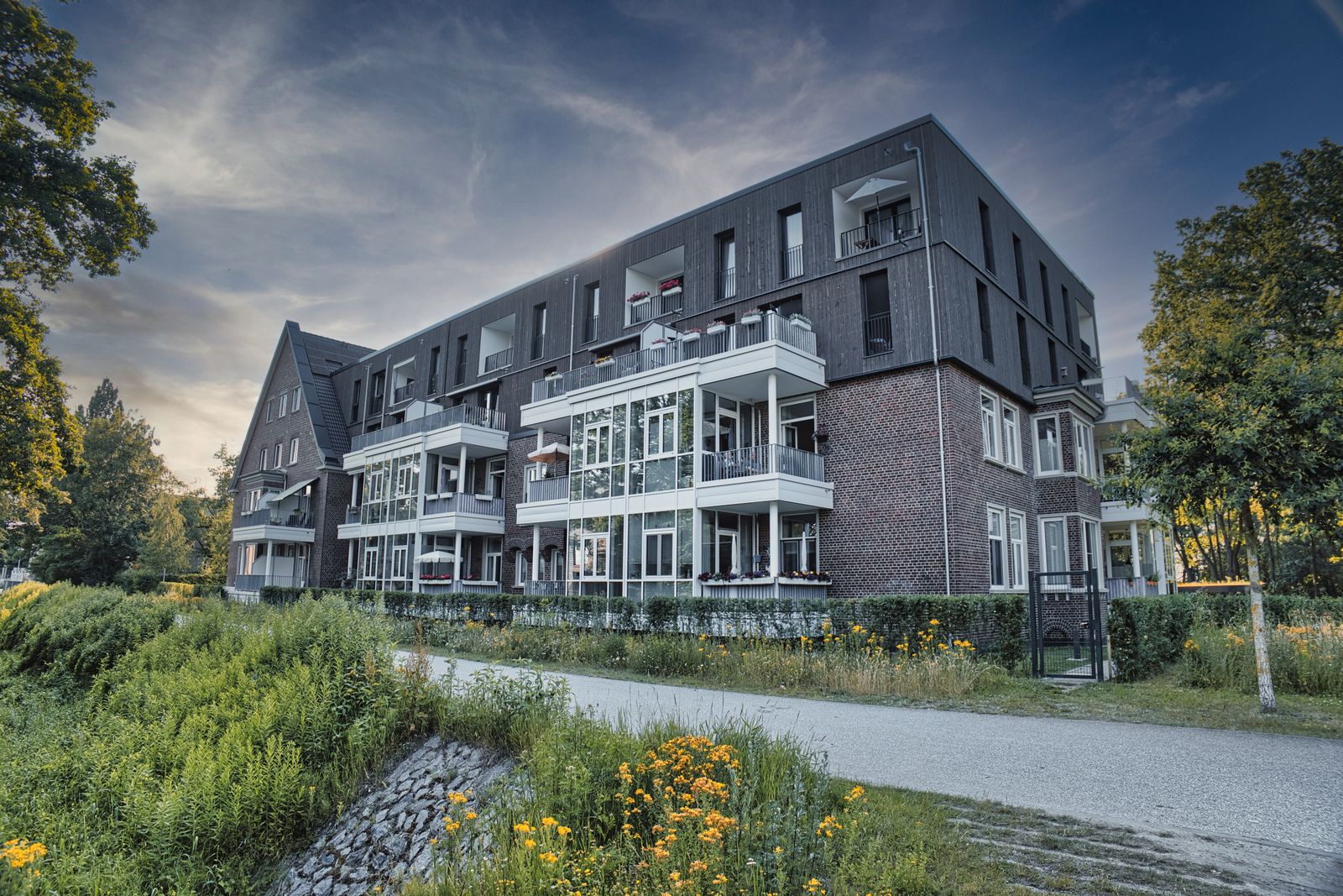 Brick rental apartment building in a city neighborhood