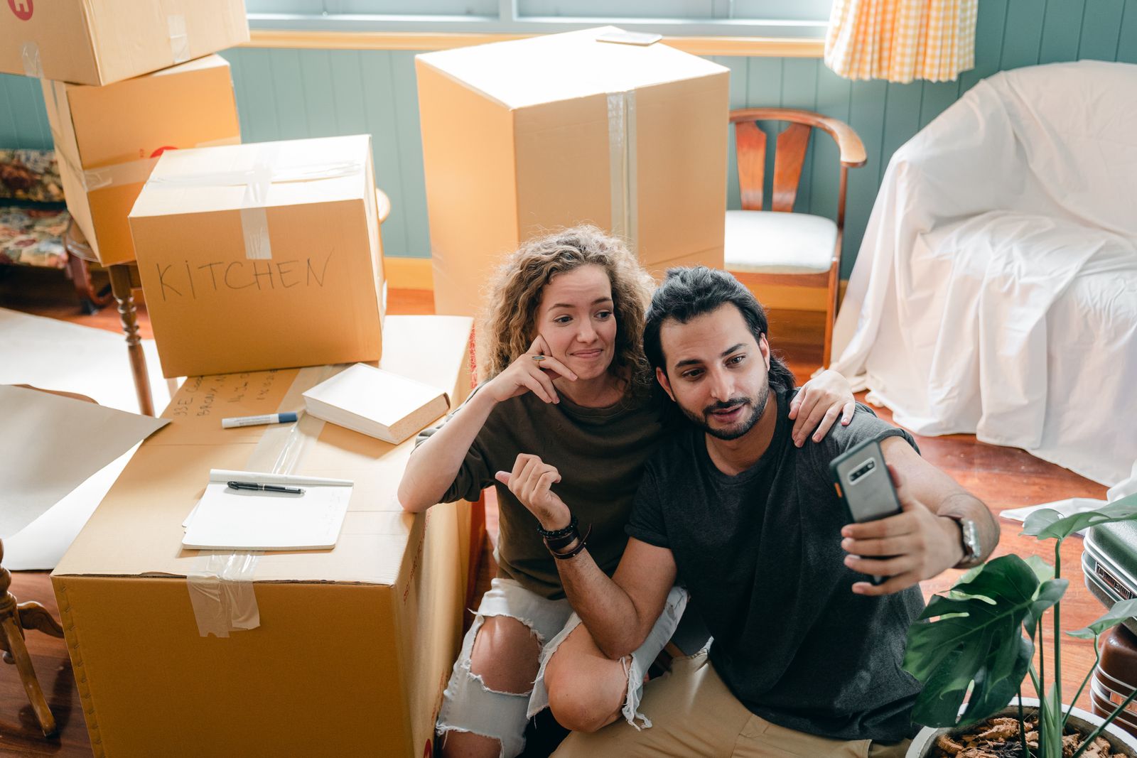 A couple moving into a new home